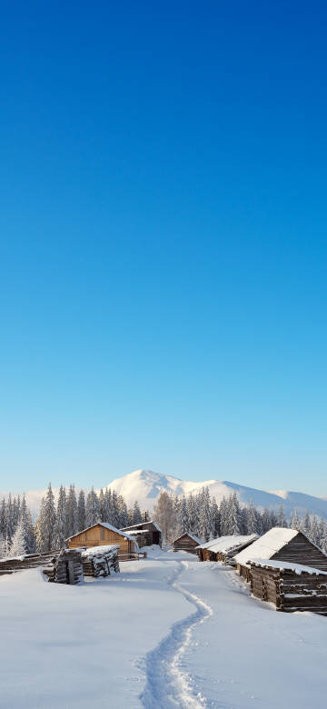 Winter snow scenery with snow covered peaks 4k phone wallpaper
