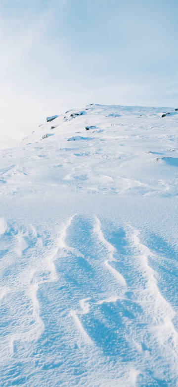 Snow covered hills pure cold phone wallpaper