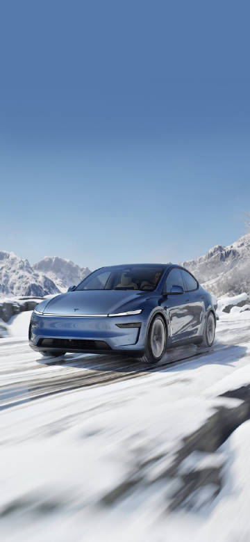 Tesla driving on snow phone wallpaper