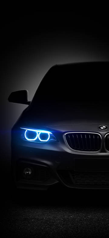 BMW turns on the blue headlights phone wallpaper