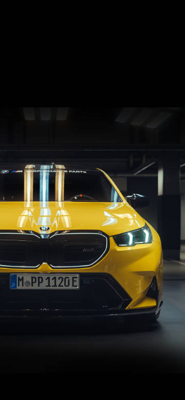 Yellow BMW black background phone wallpaper