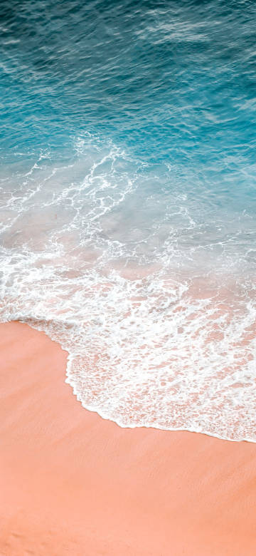 Aerial View Of A Clear Beach 4K Phone Wallpaper