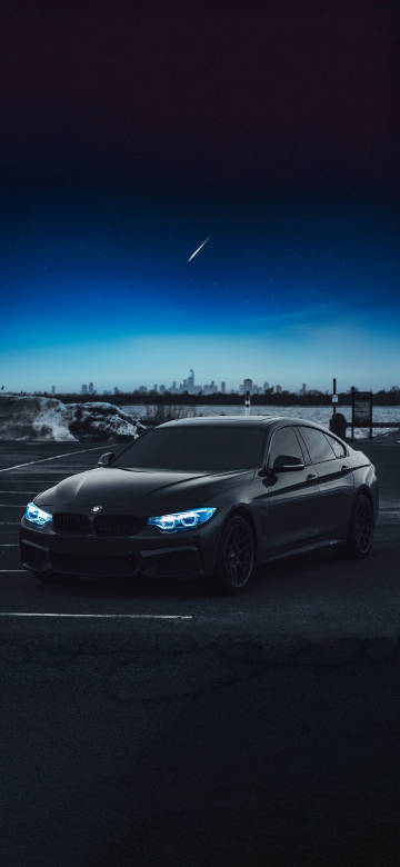 Black BMW Under Moonlight 4K Phone Wallpaper
