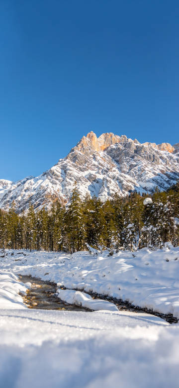 Mountains covered with snow 4k phone wallpaper