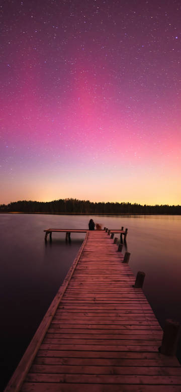 A Wooden Dock Near Purple Lake 4K Phone Wallpaper