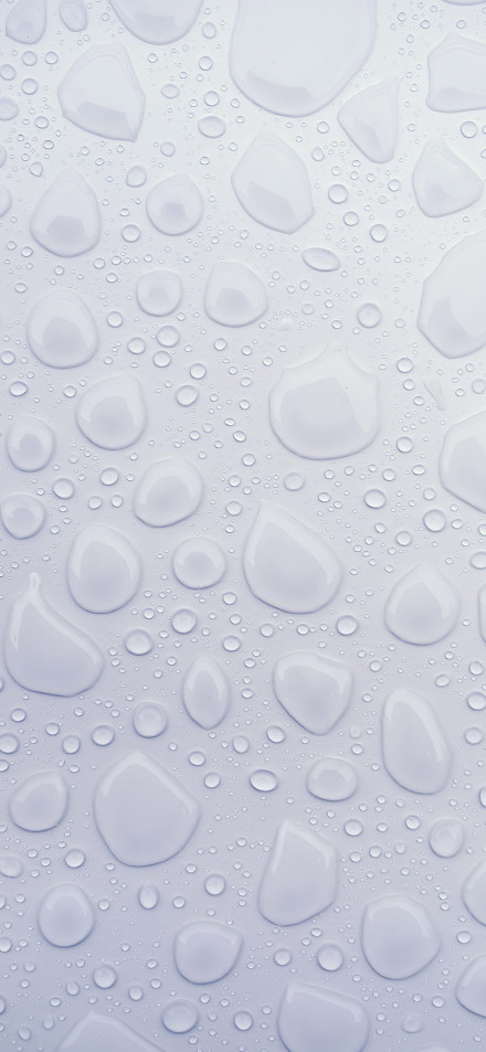 Drops Of Water On A White Surface 4K Phone Wallpaper