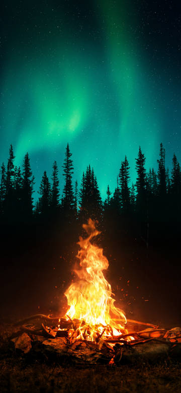 A fire under the aurora phone wallpaper