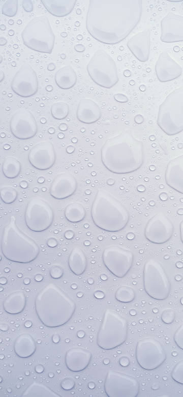 Drops Of Water On A White Surface 4K Phone Wallpaper
