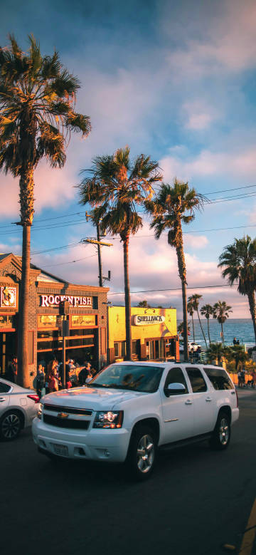 Cozy sunset seaside scenery phone wallpaper