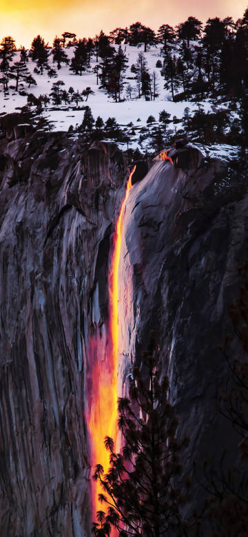 Sunset Reflection On A Dark Waterfall 4K Phone Wallpaper
