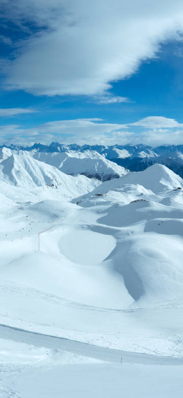 Snow-covered mountains in winter 4k phone wallpaper