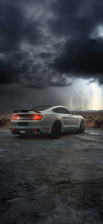 Ford Mustang under dark clouds in the sky Mobile wallpaper