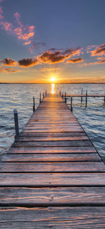 Wooden trestle at sunset 4k phone wallpaper