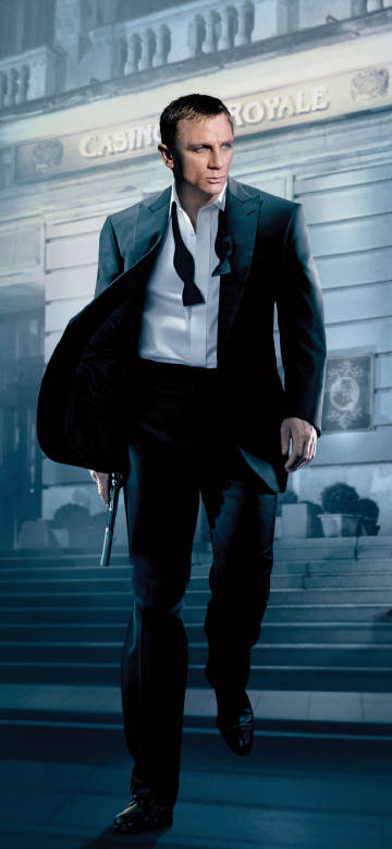 "Casino Royale" James Bond in a suit and holding a pistol