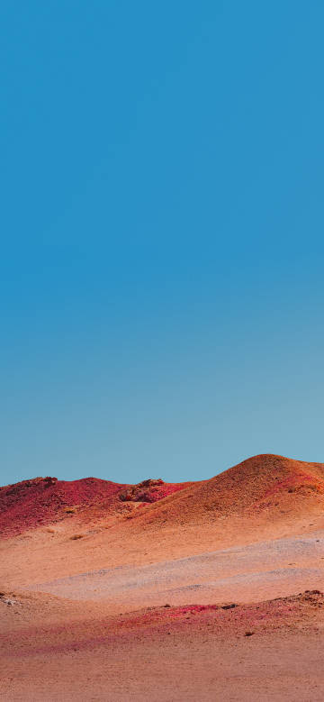 Orange sand dunes pure blue sky