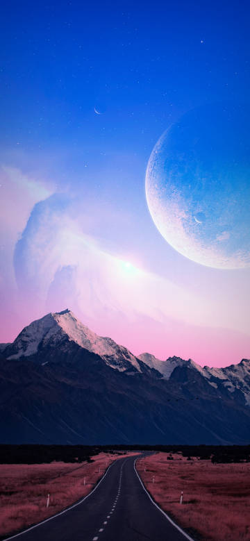 Snowy mountains and highways under colorful skies phone wallpaper