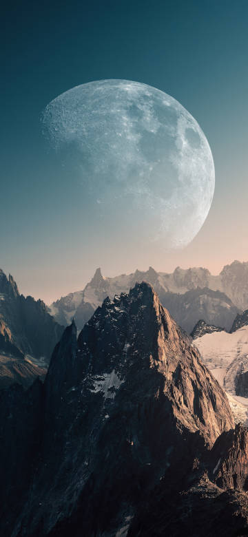 A Massive Moon Hangs Over Rugged Snow-Capped Mountains 4K Wallpaper