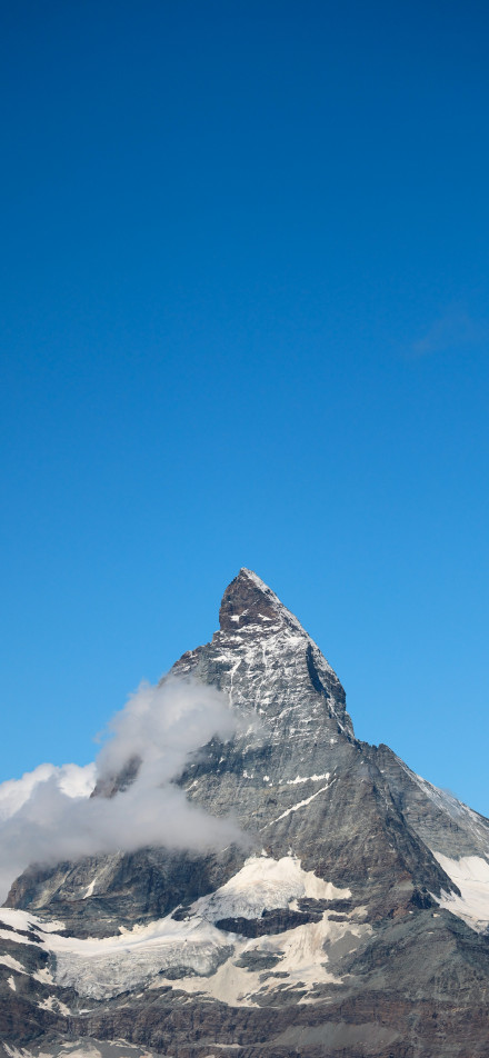 Magnificent snow-capped mountains under the pure blue sky phone wallpaper