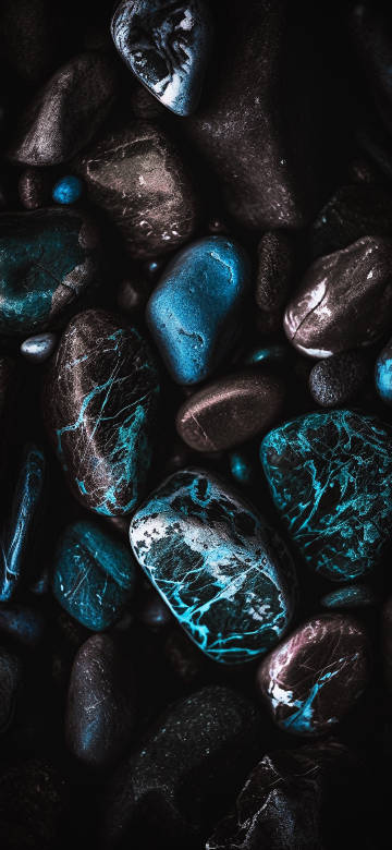 Blue and Black Stones with Glowing Veins 4K Wallpaper