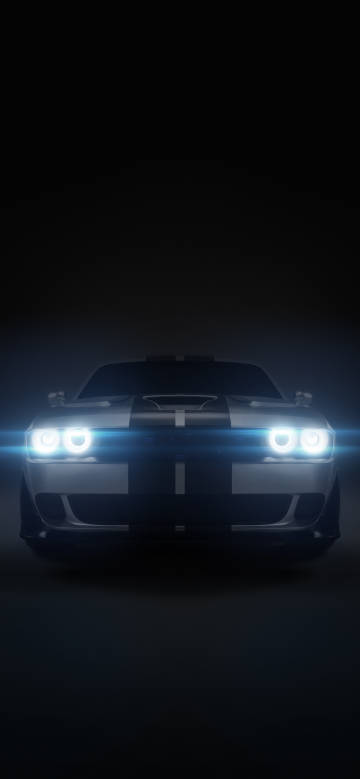 A silver-grey car with bright blue headlights phone wallpaper