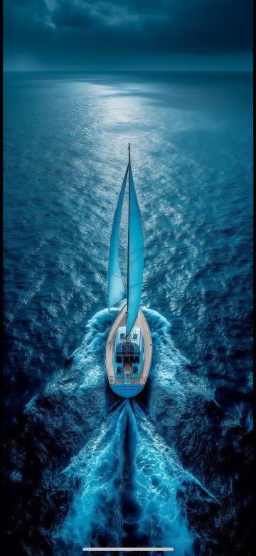 Sailboat sailing on the blue ocean phone wallpaper