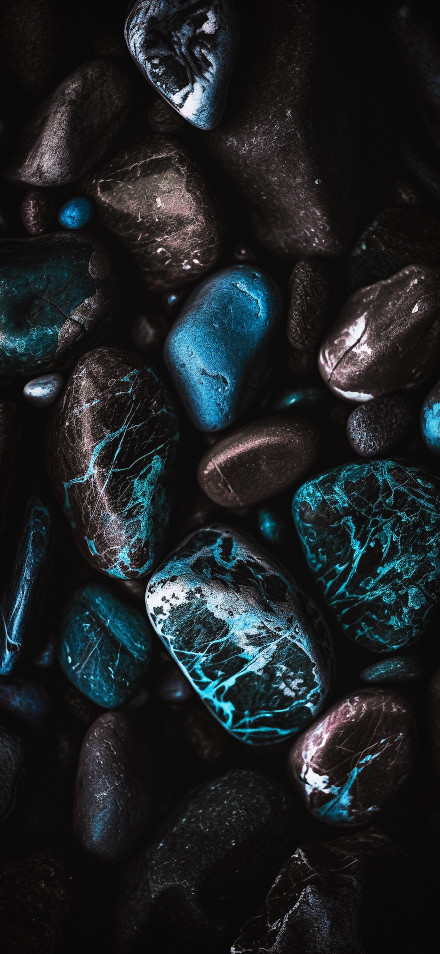 Blue and Black Stones with Glowing Veins 4K Wallpaper