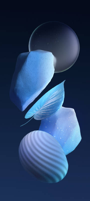 Stones and a Leaf Floating on a Dark Blue Background Wallpaper