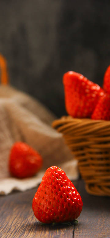 Sweet Juicy Strawberry on Wooden Table 4K Phone Wallpaper