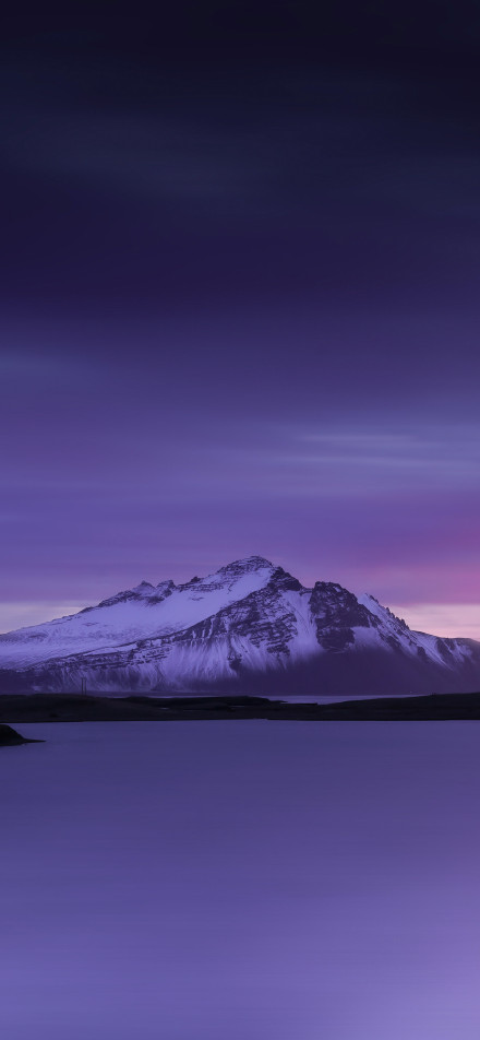 Amazing scene of Snow-capped mountains in purple night