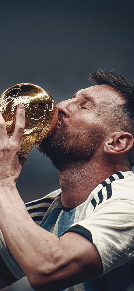 Messi passionately kissing the FIFA World Cup Trophy 4K Wallpaper