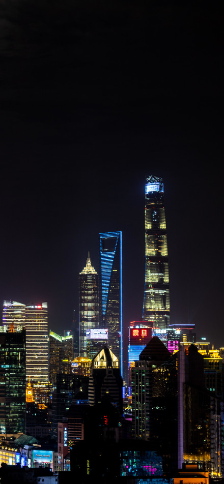 Bustling night scene of Lujiazui skyscrapers in Shanghai, China