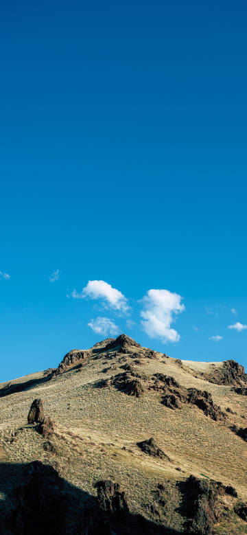 Mountains of natural beauty under a blue sky