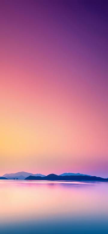 Dreamy Sunset Over Calm Purple Lake