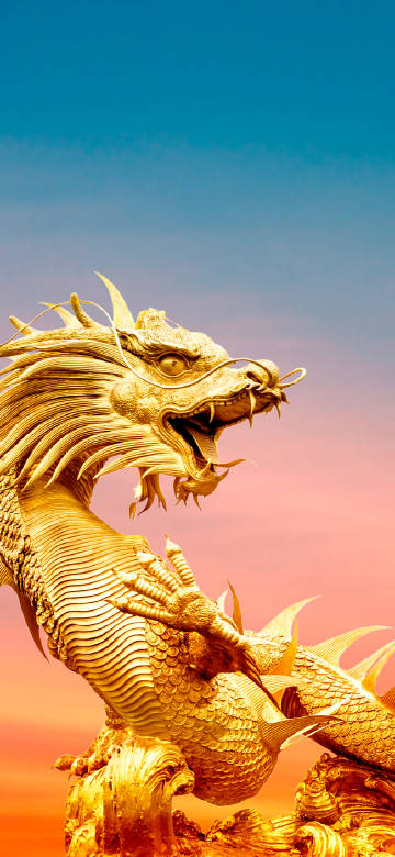Golden Chinese Dragon Statue Under Sunset Sky 4K Phone Wallpaper