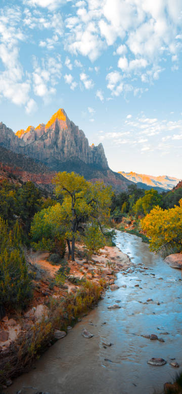 Scenery of Mountains and River in the Sunlight