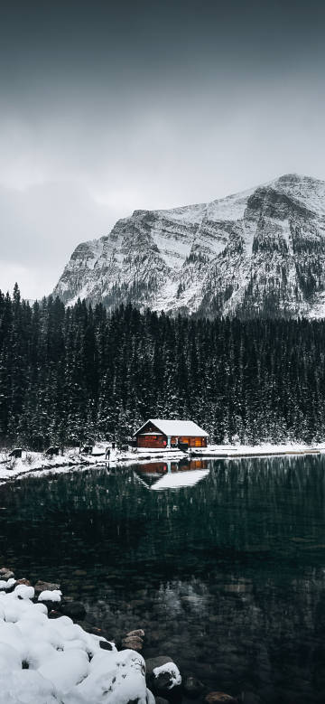 Winter Log Cabin beside the Tranquil Lake