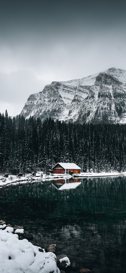 Winter Log Cabin beside the Tranquil Lake