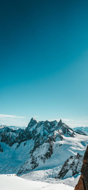 Pure Blue Sky and Snowy Mountains