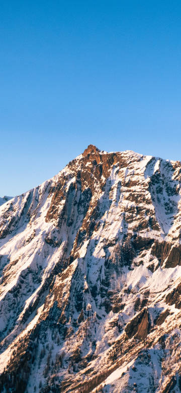 Snowy Mountain in the Sunlight