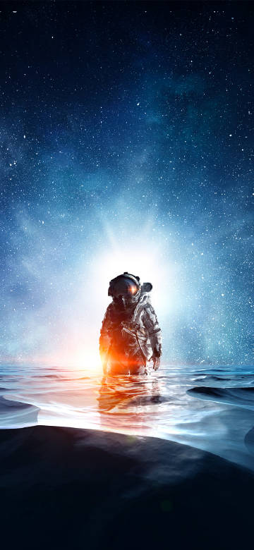Astronaut against a glowing background