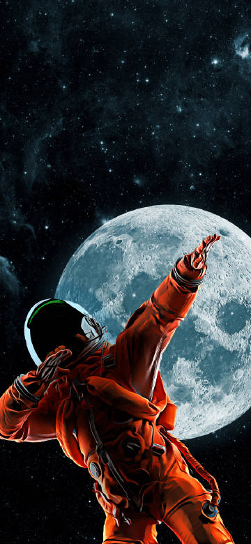 Astronaut against a starry universe background