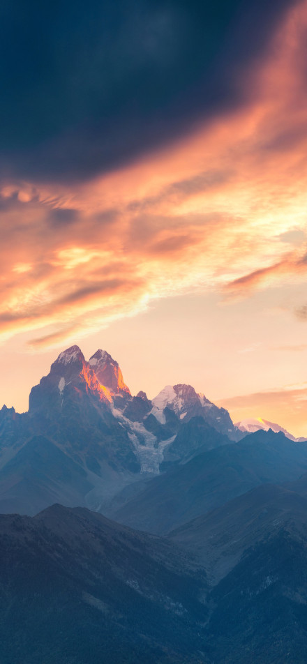 Setting Sun Gilds the Mountains