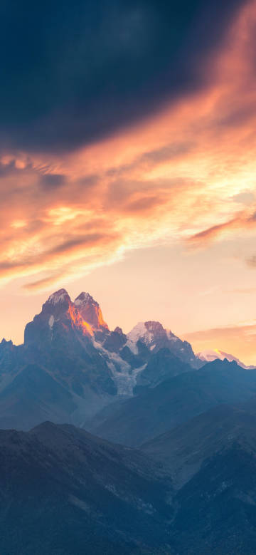 Setting Sun Gilds the Mountains