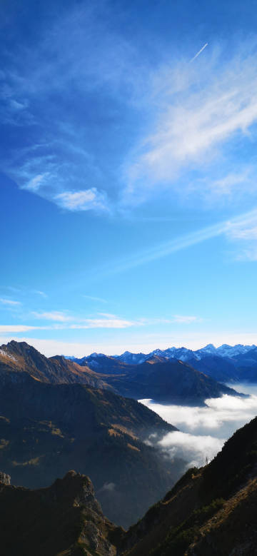 White clouds in a clear blue sky