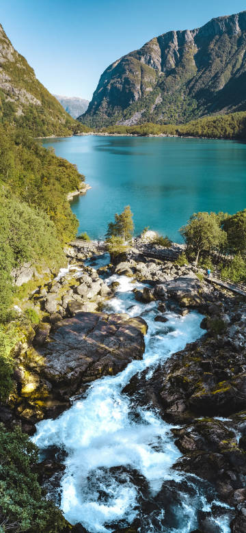Green Lake and Stream Surrounded by Mountains