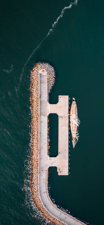 Overlooking the white boats docked at the pier