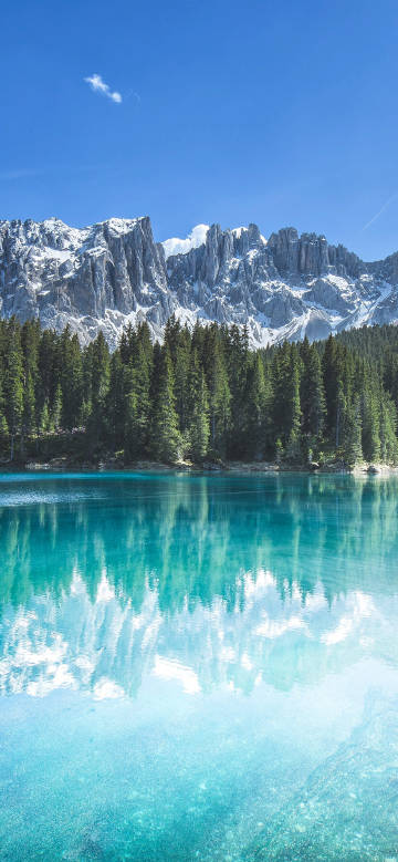 Clear lakes under snow-capped mountains