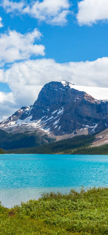 Alpine lakes under blue skies and white clouds