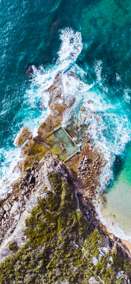 Overlooking the waves hitting the rocks