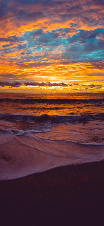 Fantastic sunset with flaming clouds